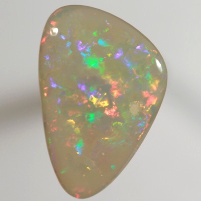 SOLID SEMI BLACK OPAL  Very bright fire, Floral Harlequin pattern. Top quality. SEE VIDEO